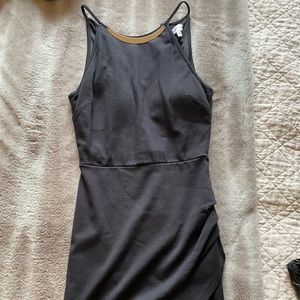 Mini dress in black with gold neck line